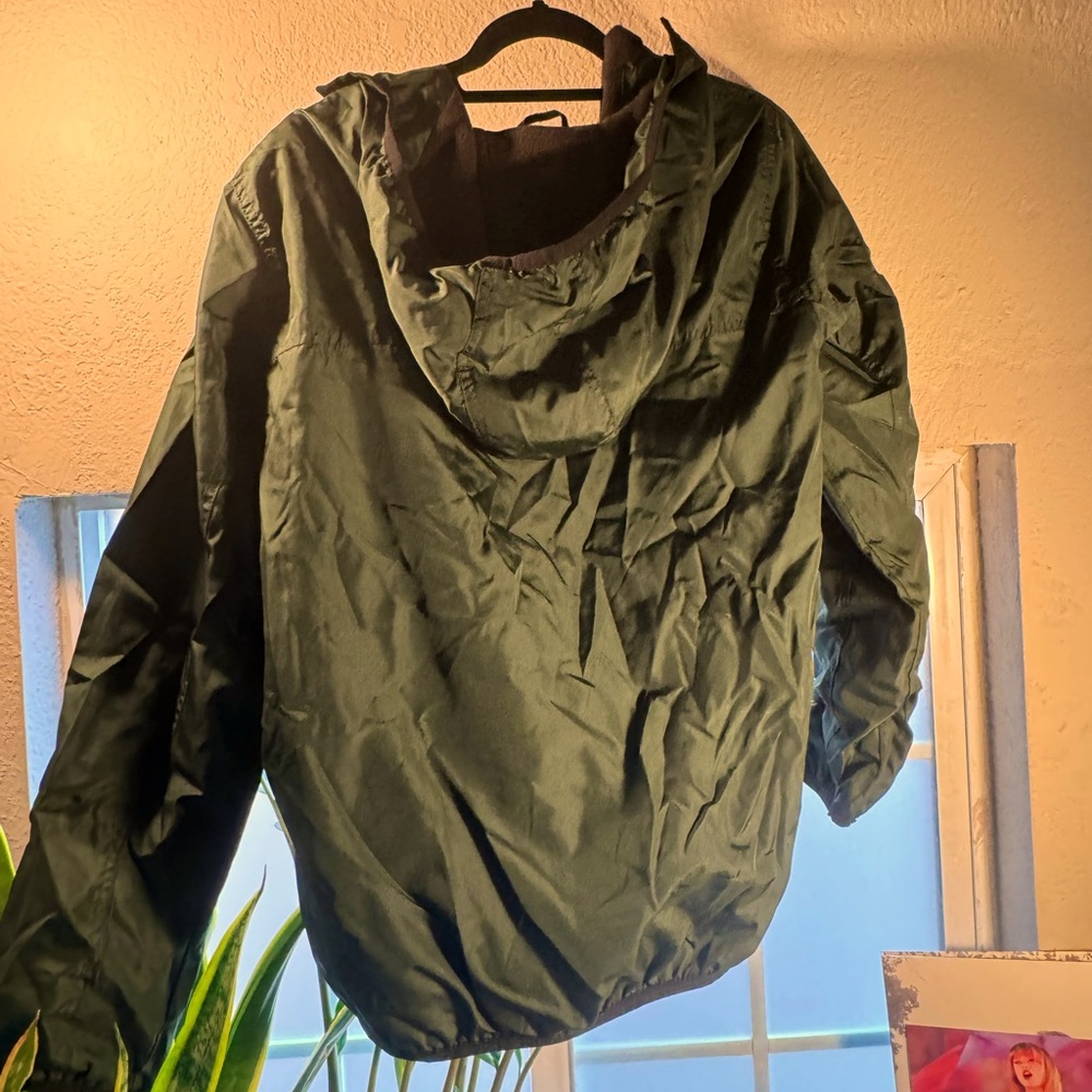 Olive green windbreaker
